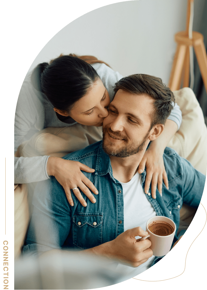 A happy couple embracing connection and clarity with the help of a brainspotting therapist near Ogden.