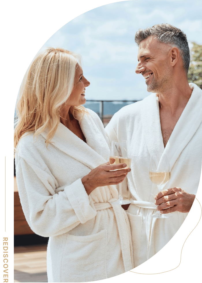 Happy couple enjoying a relaxed moment, reflecting the benefits of ACT therapy in Ogden, Utah, for rediscovering connection and fulfillment.